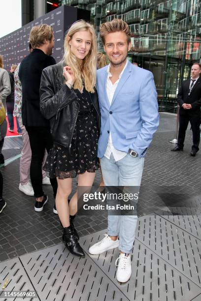 Model Larissa Marolt and German actor Joern Schloenvoigt attend the Mazda Spring Cocktail at Sony Centre on May 23, 2019 in Berlin, Germany.