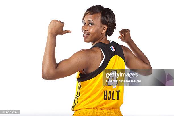 Amber Holt shows off her new jersey during the Tulsa Shock Media Day on May 23, 2011 at the Shock Basketball Academy Facility in Tulsa, Oklahoma....