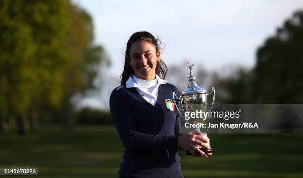 Francesca Fiorellini of Italy poses with the winners trophy following victory during the final round of the R&A Girls U16 Amateur Championship at...