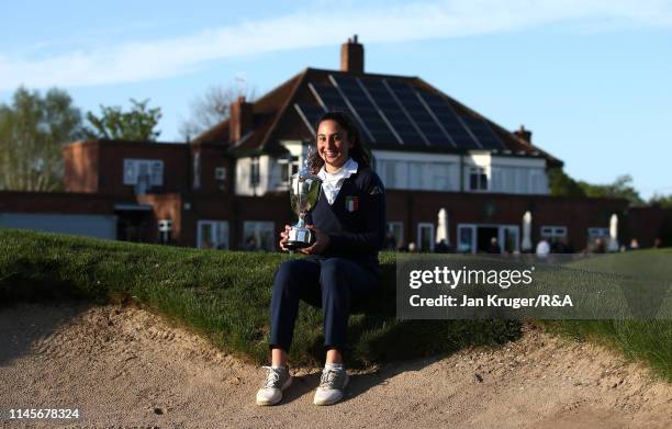 Francesca Fiorellini of Italy poses with the winners trophy following victory during the final round of the R&A Girls U16 Amateur Championship at...