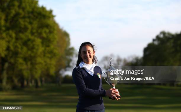 Francesca Fiorellini of Italy poses with the winners trophy following victory during the final round of the R&A Girls U16 Amateur Championship at...