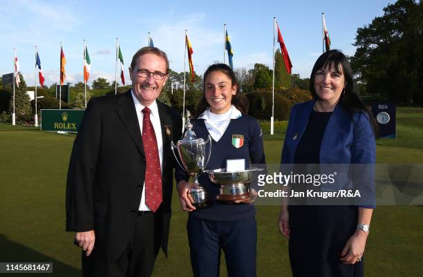 Francesca Fiorellini of Italy poses with joint Fulford GC Captains Janet Lawn and Ian Roberts during the final round of the R&A Girls U16 Amateur...