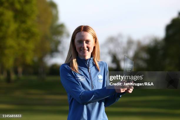 Carmen Griffiths of Aboyne poses with the runner up trophy during the final round of the R&A Girls U16 Amateur Championship at Fulford Golf Club on...