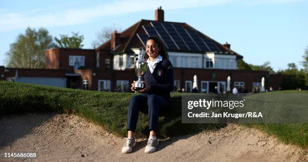 Francesca Fiorellini of Italy poses with the winners trophy following victory during the final round of the R&A Girls U16 Amateur Championship at...