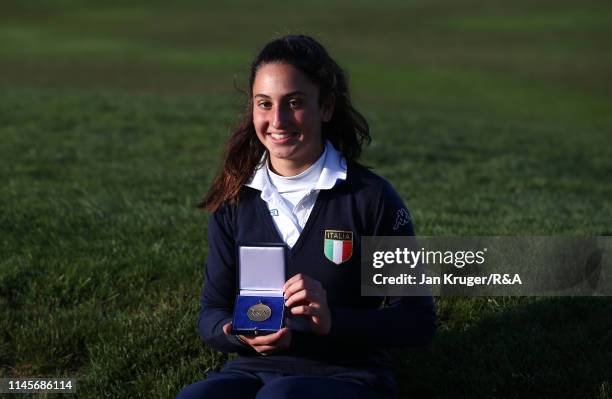 Francesca Fiorellini of Italy poses with her winners medal following victory during the final round of the R&A Girls U16 Amateur Championship at...