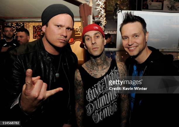 Musicians Tom DeLonge, Travis Barker and Mark Hoppus of blink-182 pose at a press party of announce the 2011 Honda Civic Tour featuring blink-182 and...