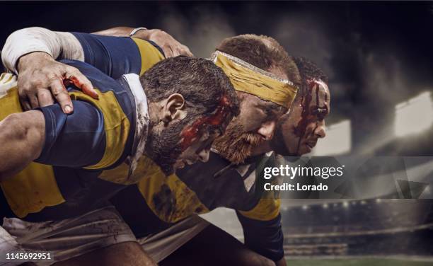 drei rugby-spieler - rugby players stock-fotos und bilder