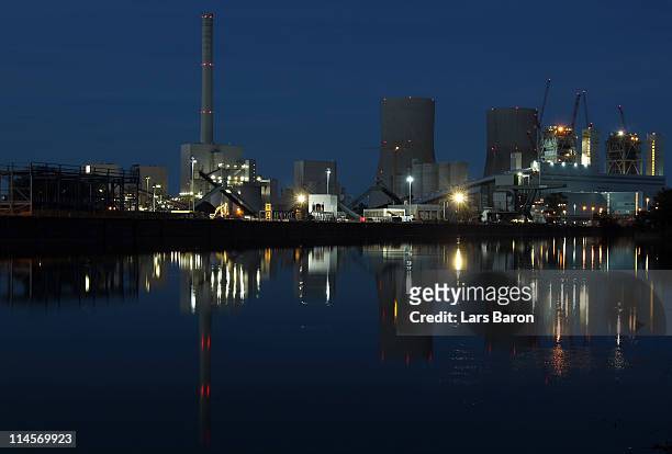 The Kraftwerk Westfallen coal-burning power plant stands illuminated on May 23, 2011 in Hamm, Germany. The plant, operated by German utilities giant...