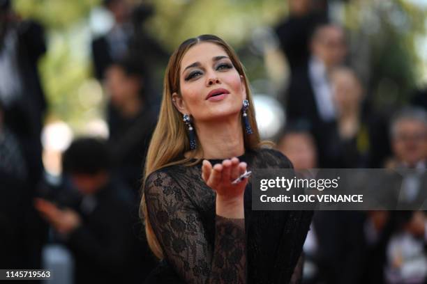 Brazilian model Ana Beatriz Barros poses as she arrives for the screening of the film "The Traitor " at the 72nd edition of the Cannes Film Festival...