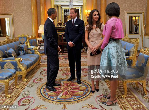 President Barack Obama and First Lady Michelle Obama meet with Prince William, Duke of Cambridge and Catherine, Duchess of Cambridge at Buckingham...