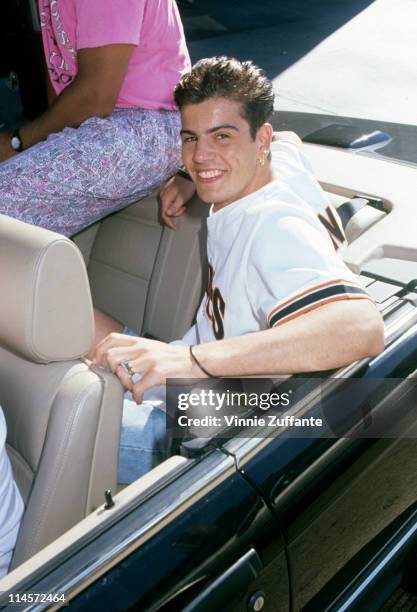 Singer Jordan Knight of New Kids On The Block sitting in the back of a convertible, circa 1990.