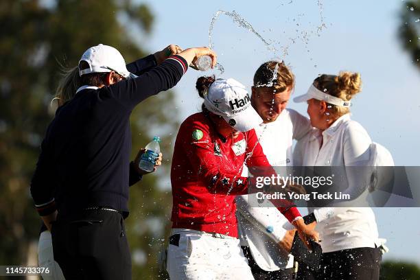 Sung Hyun Park of South Korea and Hannah Green of Australia douse Minjee Lee of Australia with water after her HUGEL-AIR PREMIA LA Open victory at...