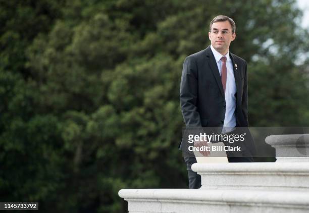 Rep. Justin Amash, R-Mich., walks up the House steps of the Capitol for the final votes before the Memorial Day recess on Thursday, May 23, 2019.