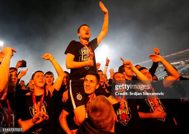 Sasa Ilic celebrates with the team mates after winning the Serbian Cup Final match between FK Crvena Zvezda and FK Partizan at stadium Rajko Mitic on...