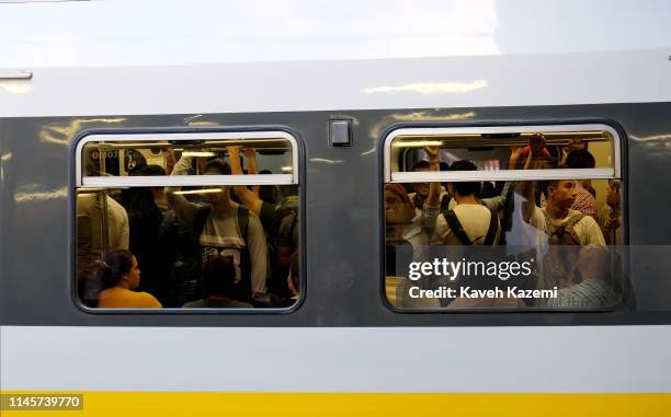 People seen in a metro car during the rush hour at Poblado station on February 13, 2019 in Medellin, Colombia.