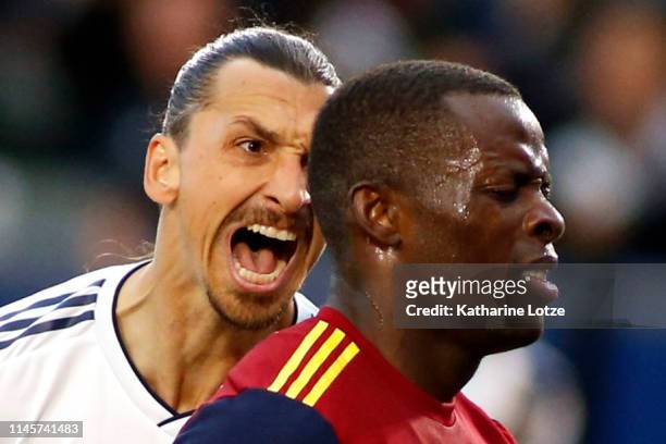 Zlatan Ibrahimovic of Los Angeles Galaxy yells at Nedum Onuoha of Real Salt Lake after scoring a goal during the second half of a game at Dignity...