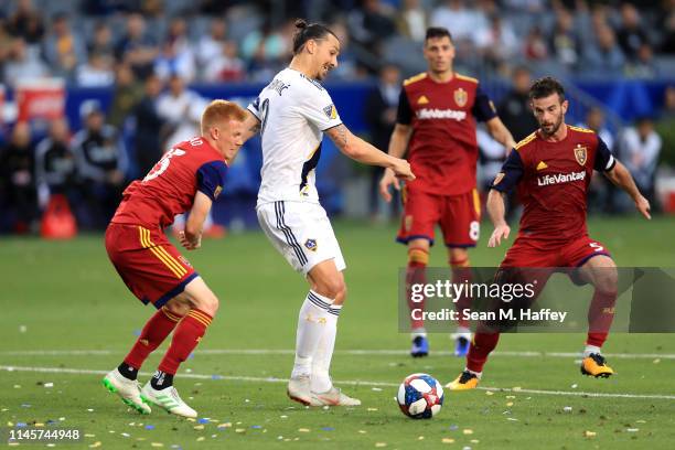 Kyle Beckerman and Justen Glad of Real Salt Lake defend against Zlatan Ibrahimovic of Los Angeles Galaxy during the second half of a game at Dignity...