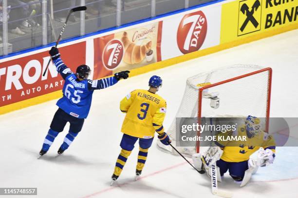 Finland's forward Sakari Manninen celebrate after scoring during the IIHF Men's Ice Hockey World Championships quarter-final match between Finland...