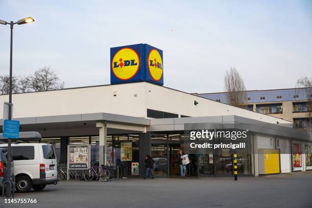 lidl supermarket in berlin, germany - lidl stock pictures, royalty-free photos & images