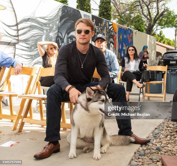 Lou Wegner with Luna the Husky attend Kids Against Animal Cruelty visits TAP The Artists Project on April 28, 2019 in Los Angeles, California.
