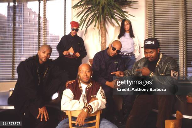 Portrait of American businessman Russell Simmons , New York, New York, 1990s. With him are Darryl McDaniels , and Joseph Simmons , both members of...