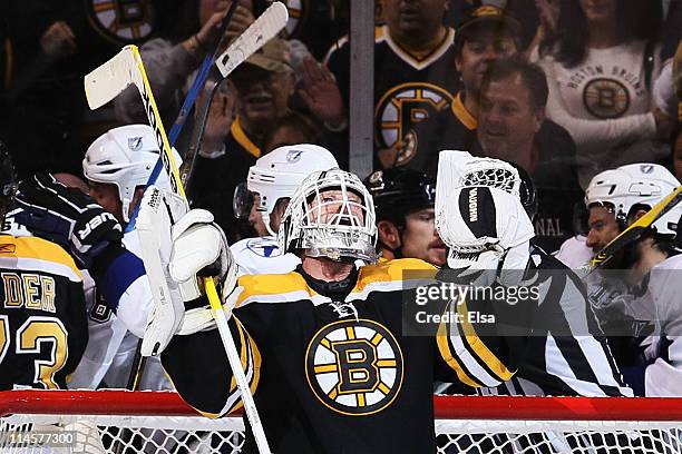 Tim Thomas of the Boston Bruins celebrates their 3 to 1 victory over the Tampa Bay Lightning in Game Five of the Eastern Conference Finals during the...