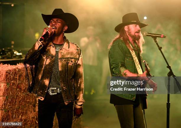 Lil Nas X and Billy Ray Cyrus perform onstage during the 2019 Stagecoach Festival at Empire Polo Field on April 28, 2019 in Indio, California.