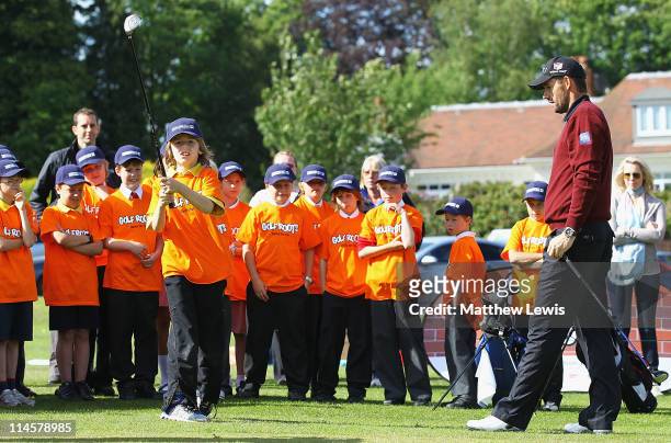 Padraig Harrington coaches children from Ascot Heath C of E Junior School and Harmanswater Primary School during an R&A Working for Golf Clinic at...