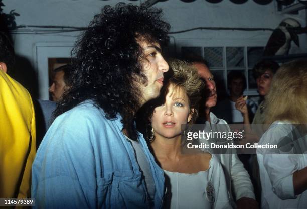 Musician Paul Stanley and Actress Lisa Hartman pose for a portrait in circa 1985 in Los Angeles, California.