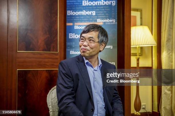 Wong Wai Ming, executive vice president and chief financial officer of Lenovo Group Ltd., looks on during a Bloomberg Television interview in Hong...