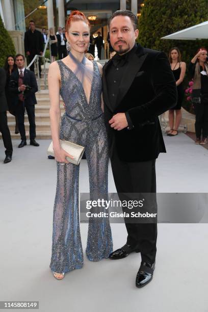 Barbara Meier and Klemens Hallmann attends the amfAR Cannes Gala 2019 at Hotel du Cap-Eden-Roc on May 23, 2019 in Cap d'Antibes, France.