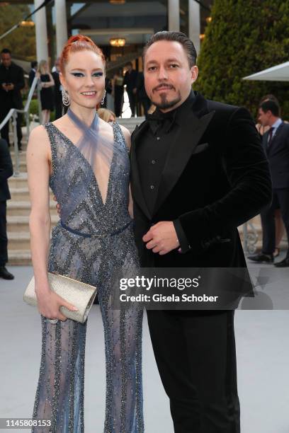 Barbara Meier and Klemens Hallmann attends the amfAR Cannes Gala 2019 at Hotel du Cap-Eden-Roc on May 23, 2019 in Cap d'Antibes, France.