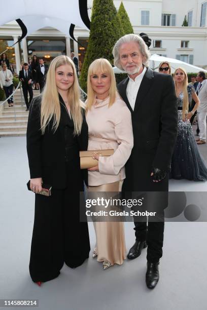 Harlow Olivia Calliope Jane , Patricia Arquette and Hermann Buhlbecker attend the amfAR Cannes Gala 2019 at Hotel du Cap-Eden-Roc on May 23, 2019 in...