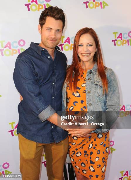 Drew Seeley and Amy Paffrath attend Tacotopia Grand Opening held at 1254 3rd Street Promenade on May 23, 2019 in Santa Monica, California.