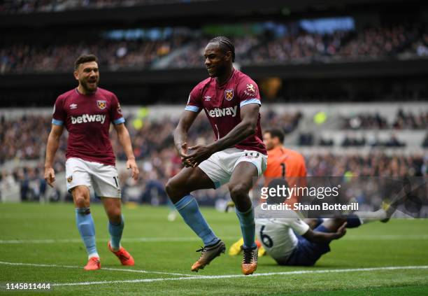 Michail Antonio of West Ham United celebrates after scoring his team's first goal during the Premier League match between Tottenham Hotspur and West...