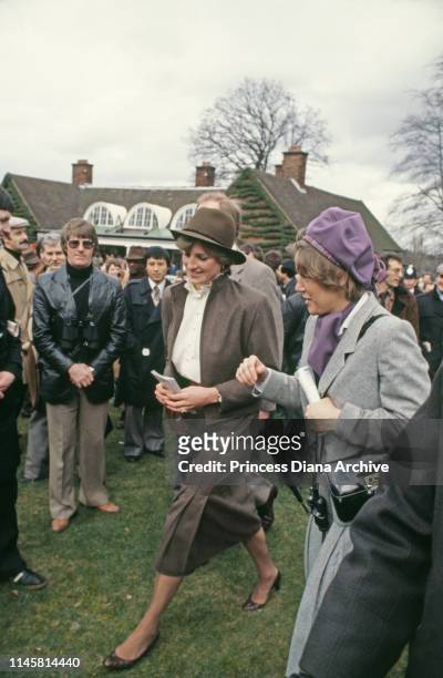 Lady Diana Spencer attends Sandown Park races in Sandown, UK, 13th March 1981; she is wearing brown suit by Bill Pashley.