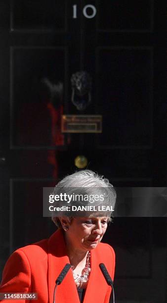Britain's Prime Minister Theresa May reacts as she announces her resignation outside 10 Downing street in central London on May 24, 2019. Beleaguered...