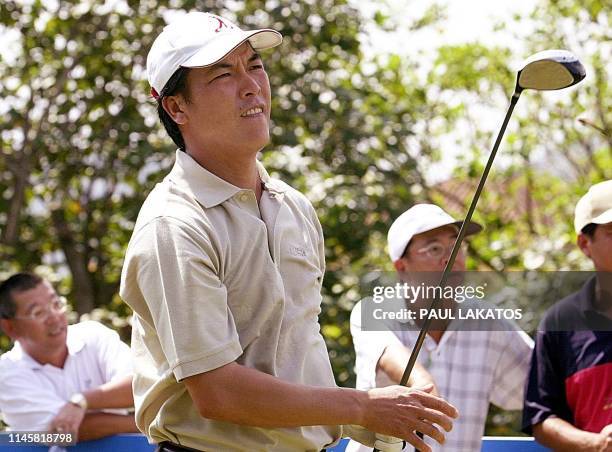 Asian PGA player Zhang Lian-wei of China tees off on 16 October 2002 for the Macau Open Pro-AM in Macau. He tees-off in tomorrow's first round as...