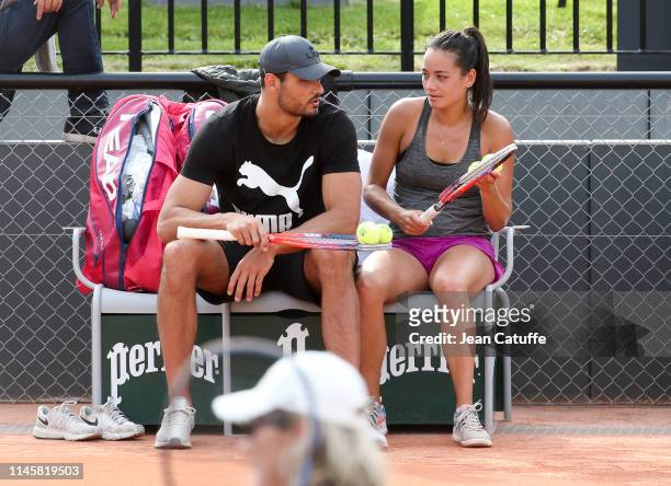 Olympic champion Florent Manaudou with his new girlfriend french tennis player Alize Lim during her practice during the 2019 French Open at Roland...