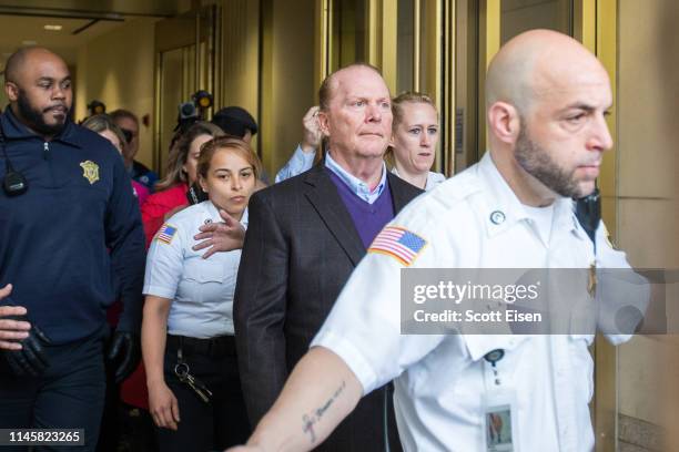 Celebrity chef Mario Batali leaves Boston Municipal Court following an arraingment on a charge of indecent assault and battery in connection with a...