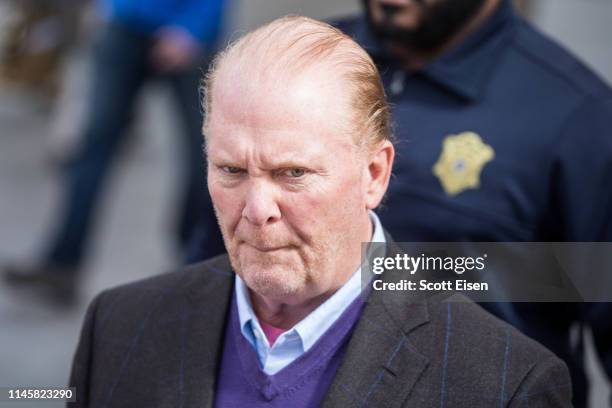 Celebrity chef Mario Batali leaves Boston Municipal Court following an arraingment on a charge of indecent assault and battery in connection with a...