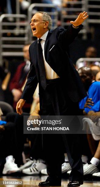 Head coach Larry Brown of the Philadelphia 76ers yells to players during NBA Eastern Conference playoff game against the Detroit Pistons 11 May at...