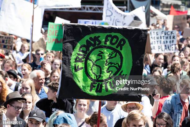 Sign reading Fridays for Future. On 24.5.2019 ten thousands protested in Munich for the protection of the climate and of the environment. They said...