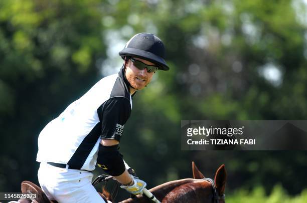 Britain's Prince Harry competes in a charity polo match the Sentebale ISPS Handa Polo Cup at the Roma Polo Club, in Rome on May 24, 2019. - The...