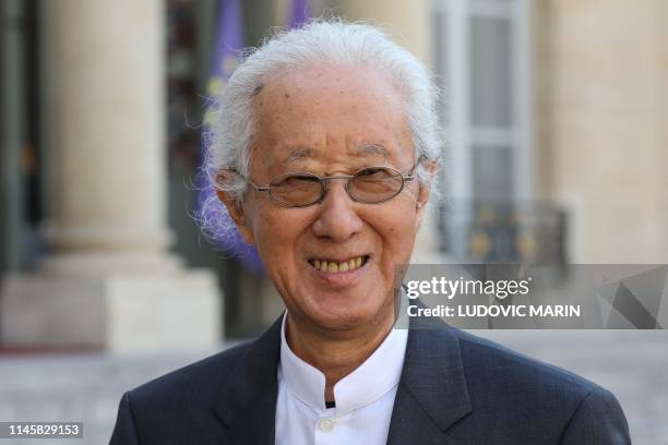 Japanese architect, Arata Isozaki, who was awarded the Pritzker Prize, poses for a photograph at the Elysee Palace in Paris where he attended the...