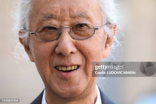 Japanese architect, Arata Isozaki, who was awarded the Pritzker Prize, poses for a photograph at the Elysee Palace in Paris where he attended the...