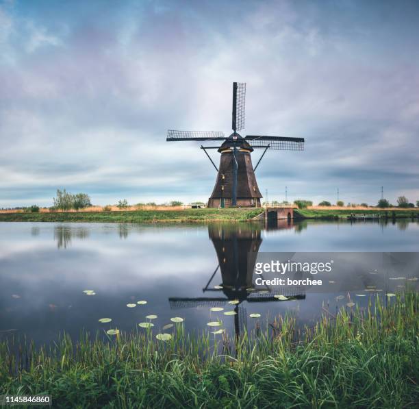 kinderdijk windmill - netherlands sunset stock pictures, royalty-free photos & images