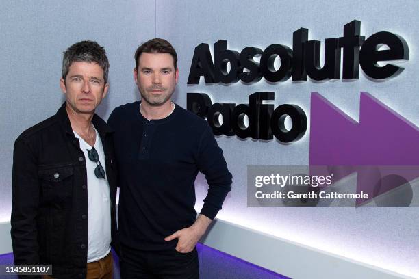 Noel Gallagher poses for a photo with Presenter Dave Berry during a visit to Absolute Radio on April 29, 2019 in London, England.