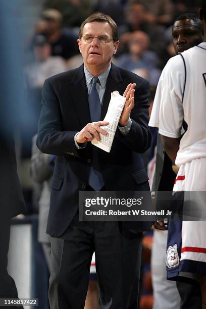 University of Connecticut assistant basketball coach George Blaney calls a time out during a game against Georgetown, Storrs, Connecticut, February...