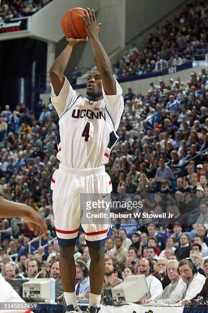 University of Connecticut All American basketball player Ben Gordon shoots a jumper in a game against Georgetown University, Hartford, Connecticut,...